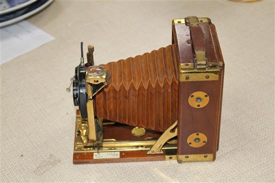 A Compur Tropical cased camera with Dialytar lens and gilt brass mounted teak case, height 18cm, depth when closed 6cm, length when